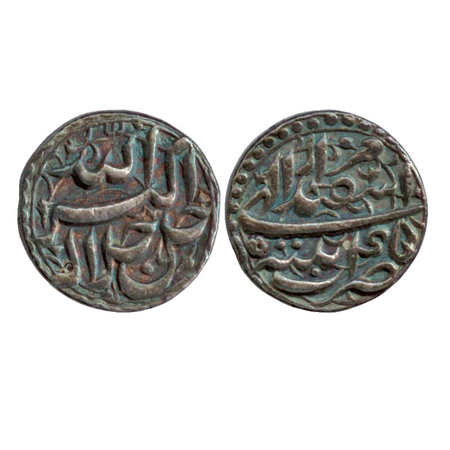 Akbar, Silver Rupee, Patna Mint, Isfandarmunz 45 (KM 93.14). Broad Flan. About Extremely F