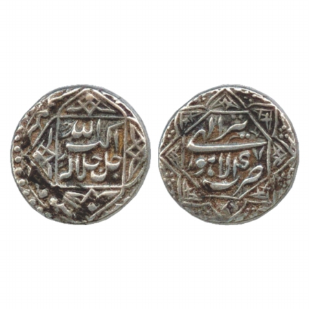Akbar (1556-1605 AD), Silver Rupee, Lahore Mint, Tir 47. Legend within 4 pointed star on o
