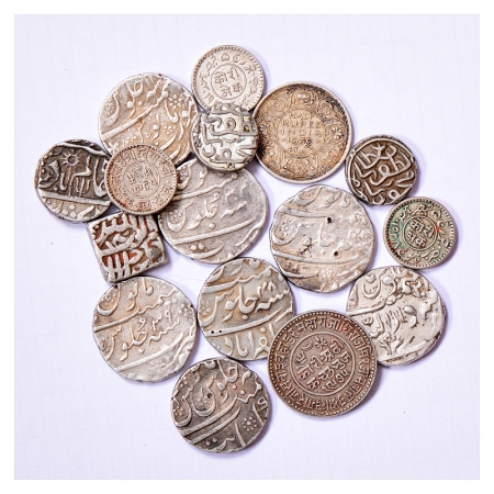 A group of 16 Silver coins, 9x Mughal Silver Rupee, 2x Gujarat Sultan, 3x Kutch Kori, 1x K