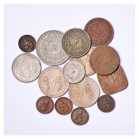 A group of 15 coins, 10x Hyderabad, 8 Annas, 4 Annas, 2 Annas, Anna and others and 5x Pudu