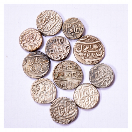 A group of 11 Princely States Silver coins, includes Bikanir, Bundi, Jaipur, Jaisalmer, Ka