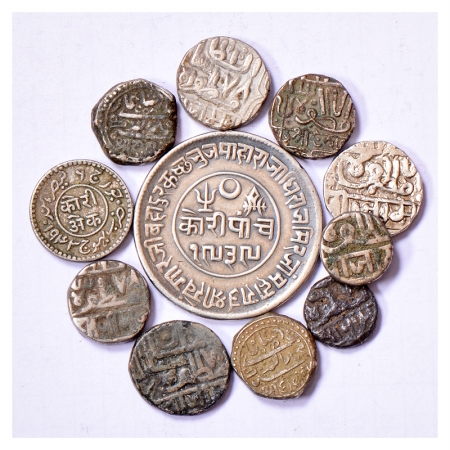 A group of 11 Silver coins, 1x Kutch 5 Kori and 10x Kutch and Jamnagar Kori and 1/2 Kori. 