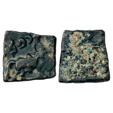 Obv: Bull walking to right, only hind part visible; Brahmi legend Kutapadasa inscribed ups