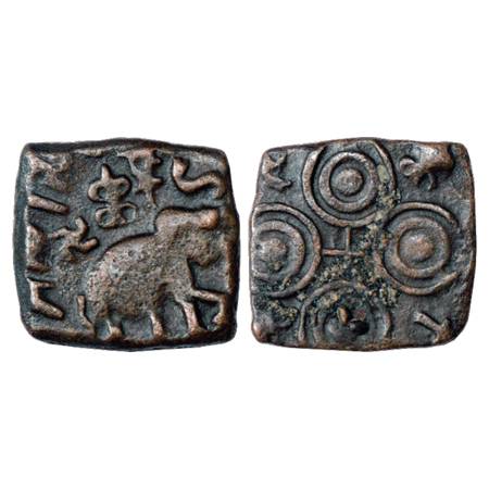 Obv: Elephant with trunk upraised, walking to right, a row of three symbols: Swastika, Shr