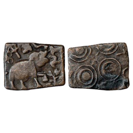 Obv: Elephant with trunk upraised, walking to right, a row of three symbols: Nandipada, tr