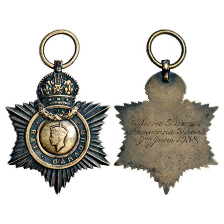 George VI , 'Rai Bahadur' title badge Silver 40.14. Obv: Portrait bust of George VI, award