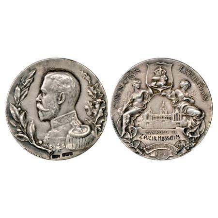 Great Britain , coronation Exhibition 1911, Silver Medal, 27.03g. Obv: Portrait bust of Ge