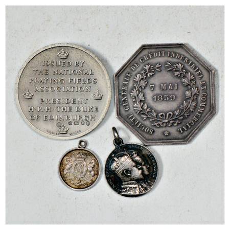A group of 4 foreign Medals , 3x Silver and 1x Copper-Nickel. (4 Medals)