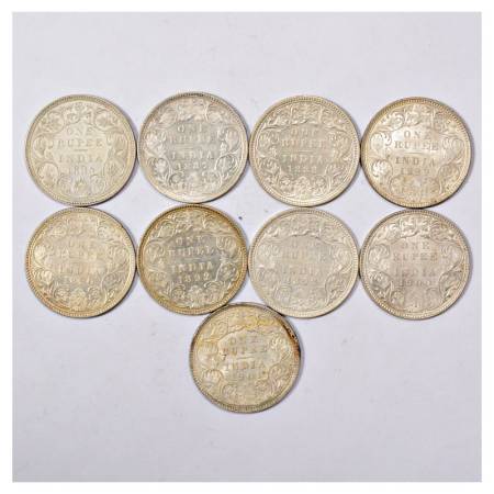 A group of 9 British India Silver Rupee, Victoria Empress, included dates 1885, 1887, 1888