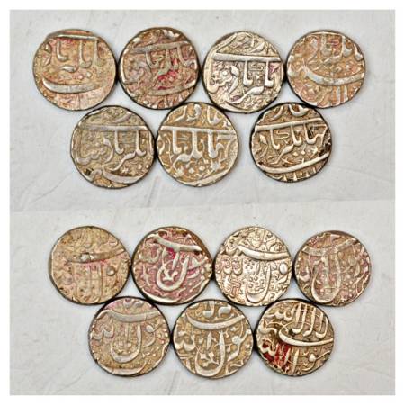 A group of 7 Jahangir Silver Rupee, includes Ahmadnagar, Fathnagar and Zafarabad types. (7