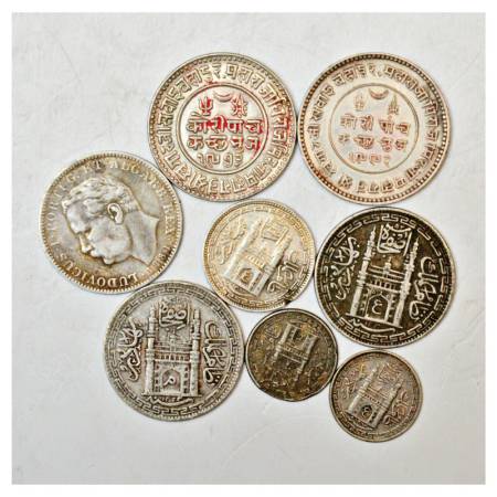A group of 8 Silver Coins, includes State and Portuguese India, various rulers, denominati