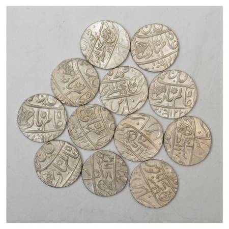 A group of 12 Bengal Presidency UNC Silver Rupee, Muhammadabad Banaras Mint, various dates