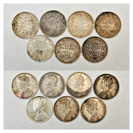 A group of 7 British India Silver Rupee, includes 4x 1862, 1x 1881 and 2x 1898, various va