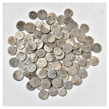 A group of 104 Mughal silver rupees, includes Shah Jahan, Aurangzeb, Muhammad Shah, variou