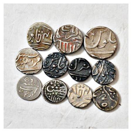 A group of 11 silver fractions, 1x Mughal, 6x Princely states, 1x Indo French, 3x Presiden