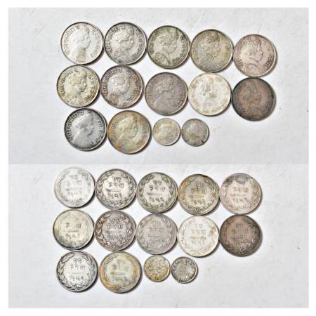 A group of 14 Baroda silver machine struck coins, Sayaji Rao III, includes 12x 1 rupee and