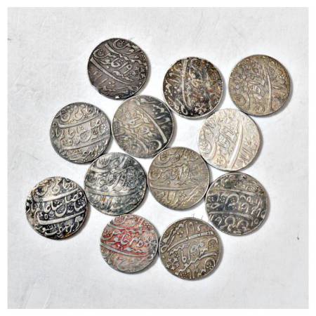 A group of 12 Bengal Presidency silver rupee, includes Farakhabad & Murshidabad mint. (12 
