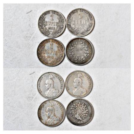 A group of 4 foreign silver rupee coins, includes 1x Burma and 3x German East Africa, vari
