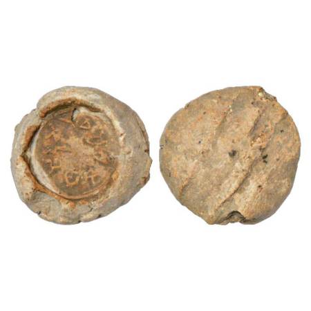 Central India, circular terracotta sealing in buff clay with Brahmi inscription Amatya San
