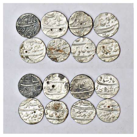 A group of 8 Mughal silver coins, 1x Salim rupee, 2x rupee, and 5x ½ rupees. (8 coins)