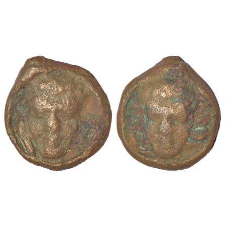 Cast jewellery component in bronze showing a human face on both side - most likely of a Ya