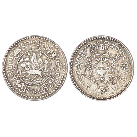 Tibet, silver 1 ½ srang, KM Y24, 6.04g. Obv: Snow lion facing in front of mount Kailash wi