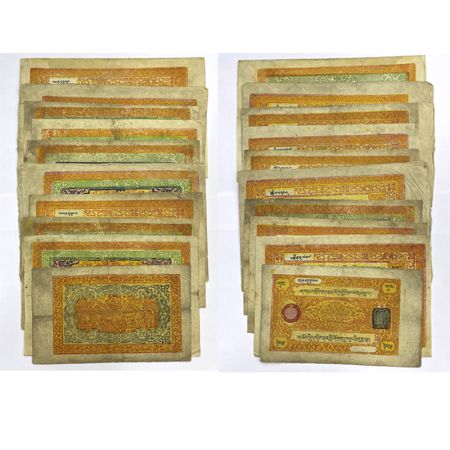 A group of 10 Tibet notes, 9x 100 srang and 1x 25 srang, issued between 1942-1959 AD. (10 