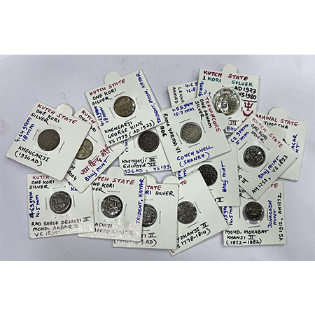 A group of 15 Princely State silver coins, includes Garhwal, Junagadh, Kutch and Travancor