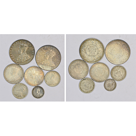 A group of 7 George V silver coins, includes 2x rupee, 2x ½ rupee, 2x ¼ rupee and 1x 2 ann