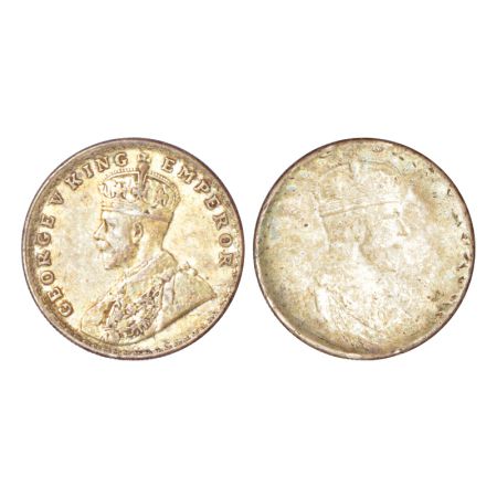 George V, silver rupee, obverse part brockage (Lakhi) on reverse. Good very fine, Rare.