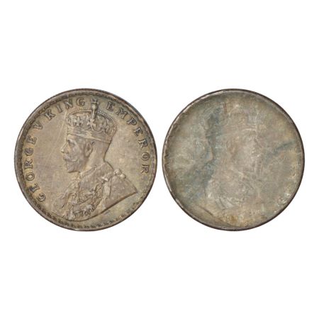 George V, silver rupee, obverse part brockage (Lakhi) on reverse. Good very fine, Rare.