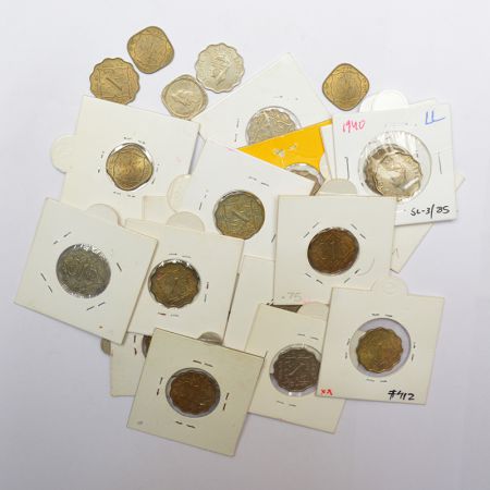A group of 23 George VI cupro-nickel and nickel-brass coins, includes 17x 1 anna and 6x ½ 